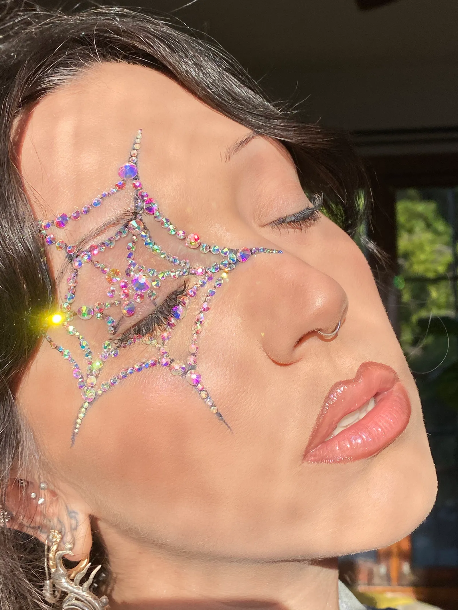 Sydney Szramowski bedazzled spiderweb makeup 2.webp
