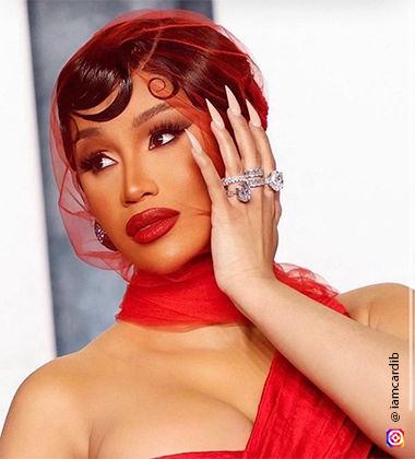 cardi b wearing a red dress
