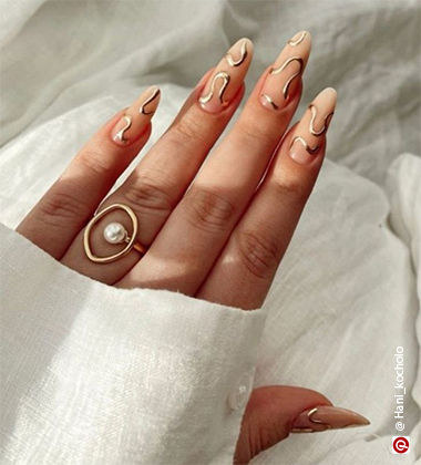 a hand with a ring on it