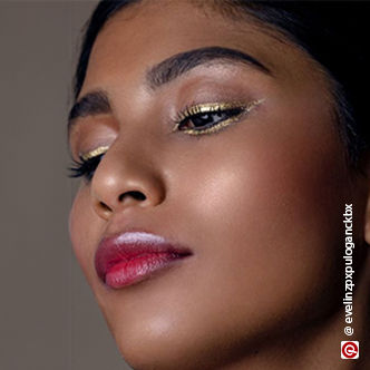subtle makeup with golden eyeliner