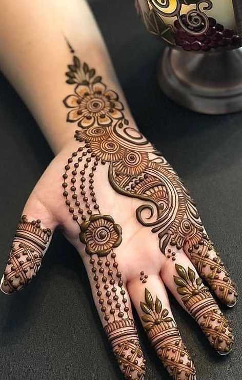This contains: Mehendi design