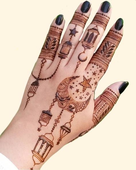 This may contain: a woman's hand is decorated with hennap and lights on it,
