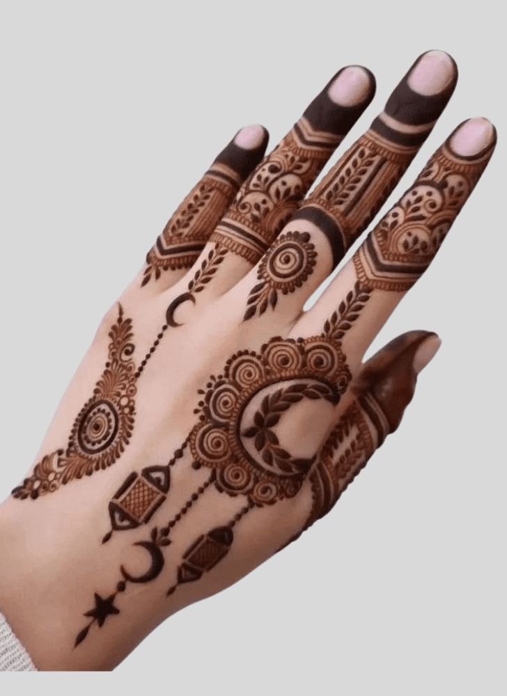 This may contain: a hand with henna tattoos on it