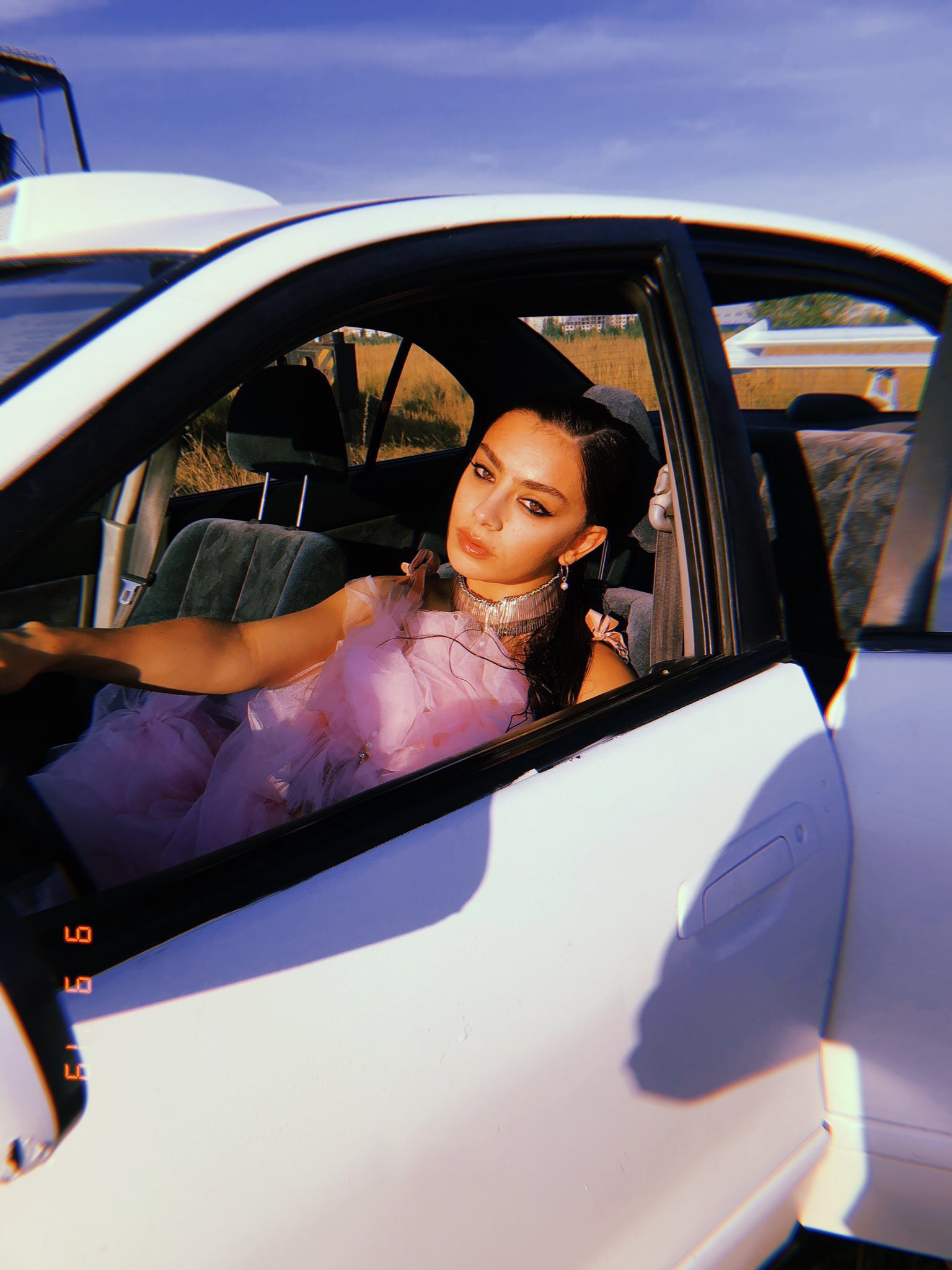 Charli XCX in a car