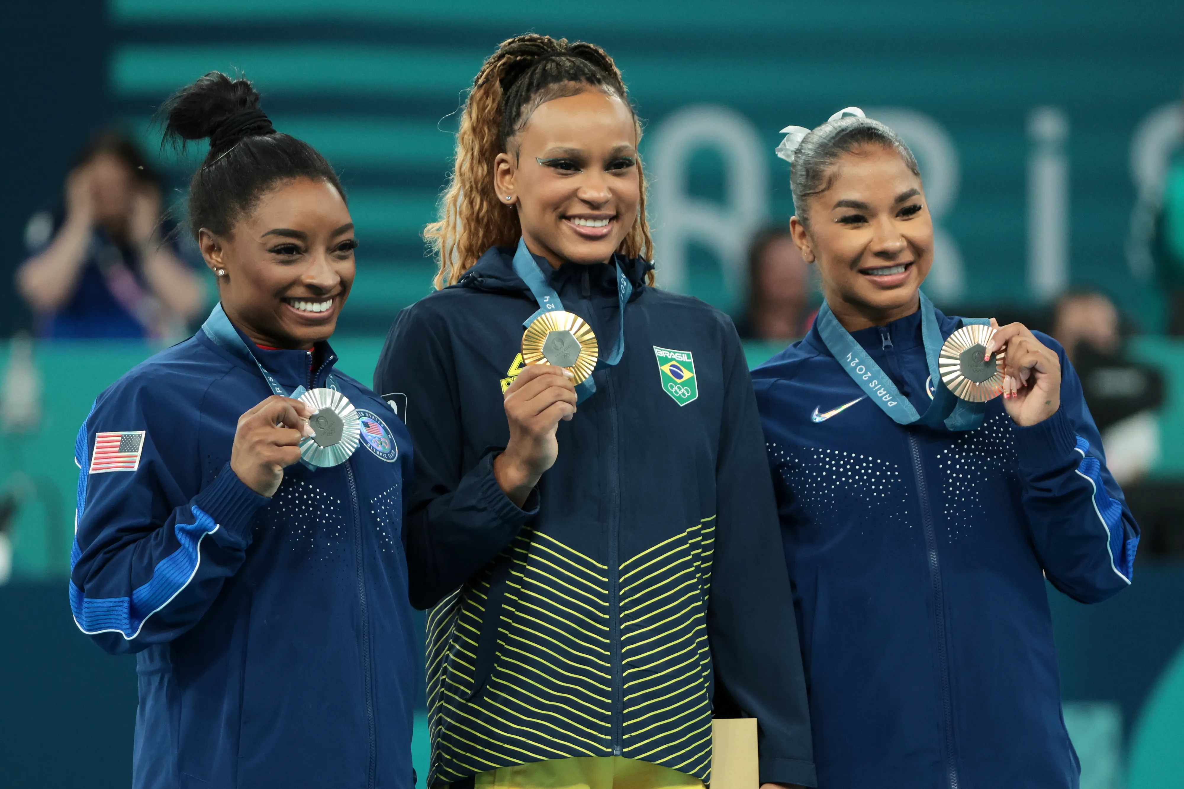 Rebeca Andrade of Team Brazil, silver medalist Simone Biles of Team United States and bronze medalist Jordan Chiles at the Paris Olympics 2024.