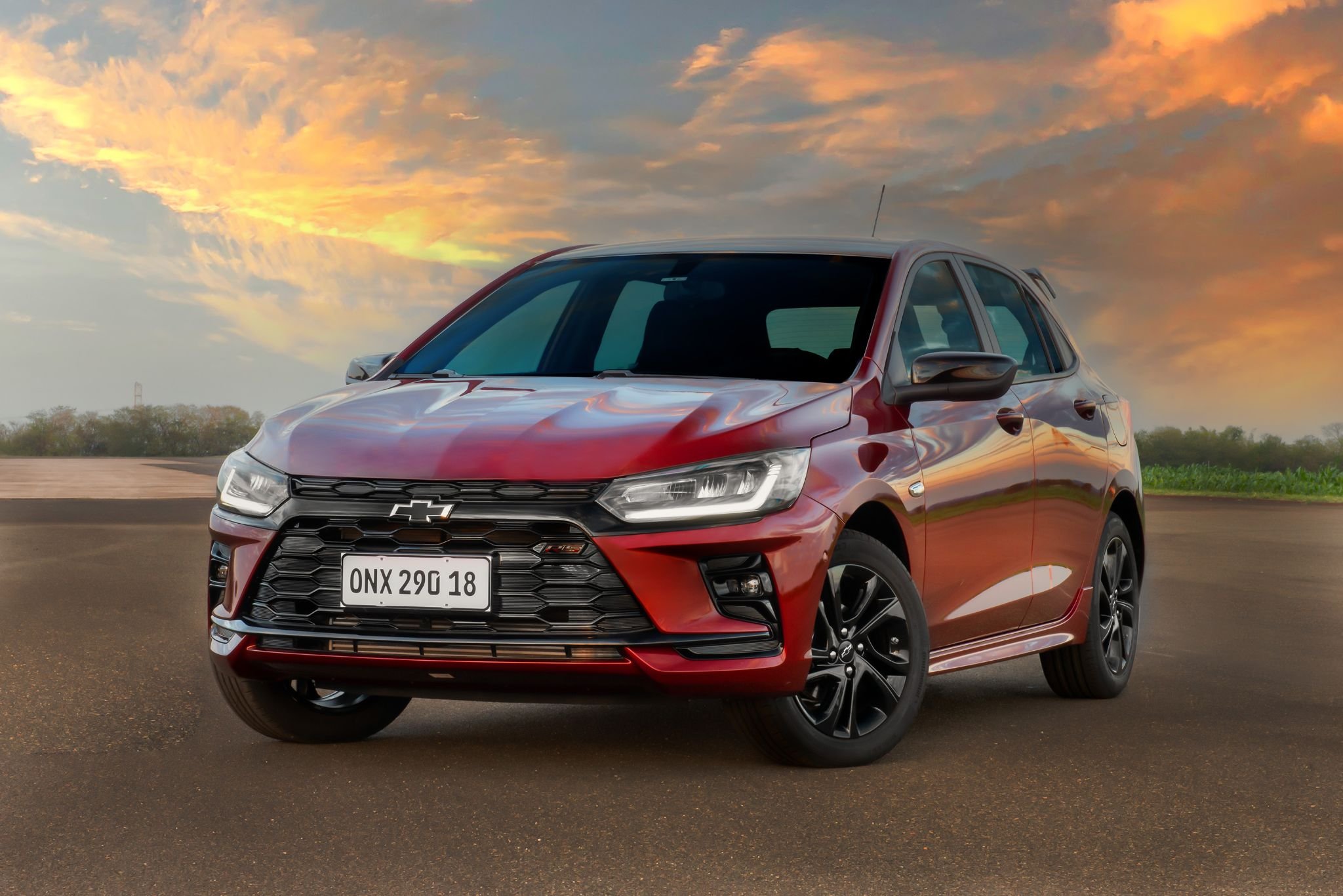 chevrolet 2026 onix rs vermelho scarlet frente parado