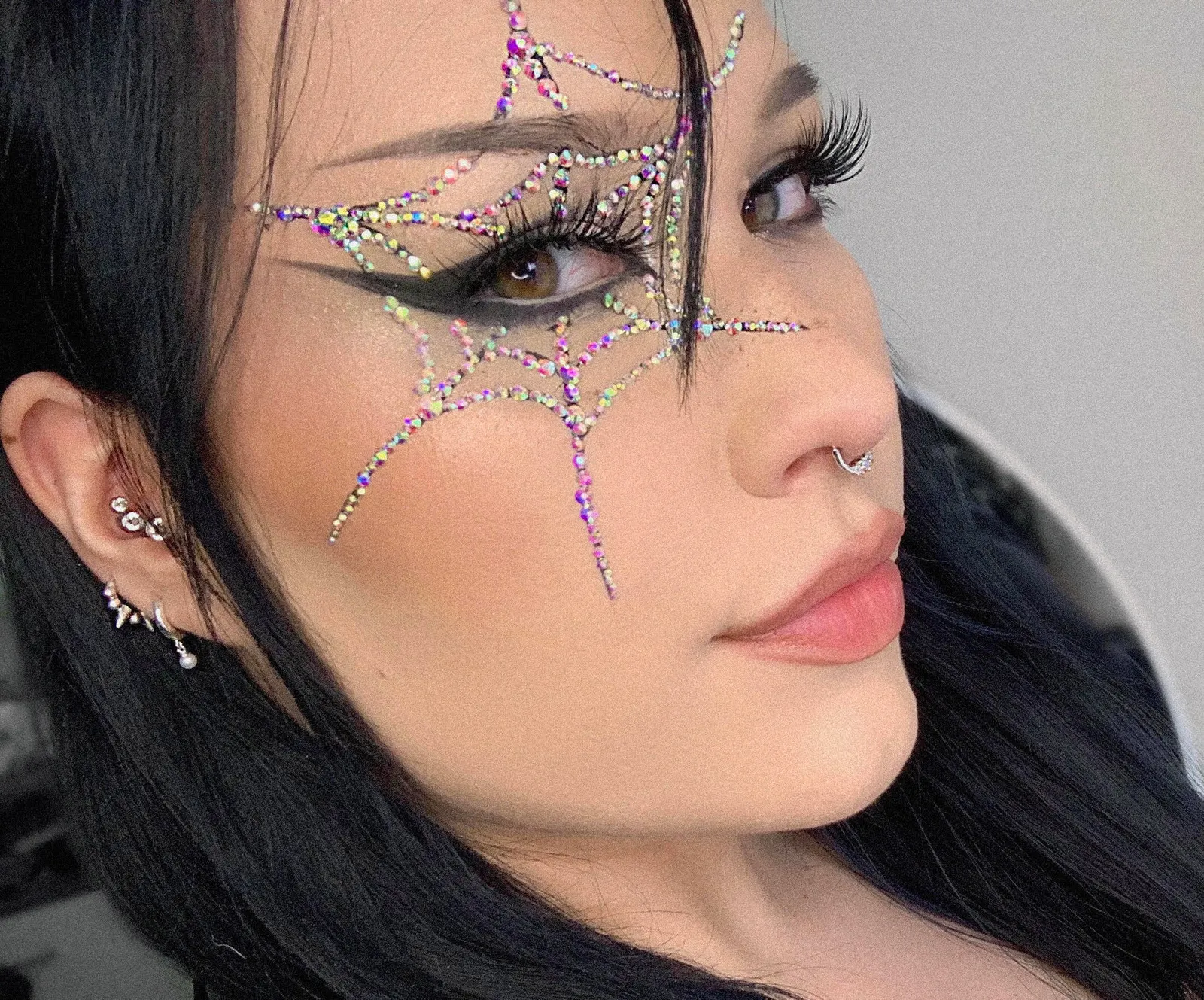 Teo Nagy bejeweled spiderweb makeup 2.webp