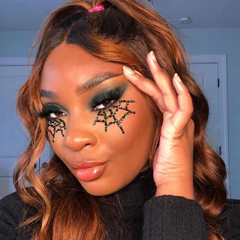 _glambymykaila spider web gem makeup.webp